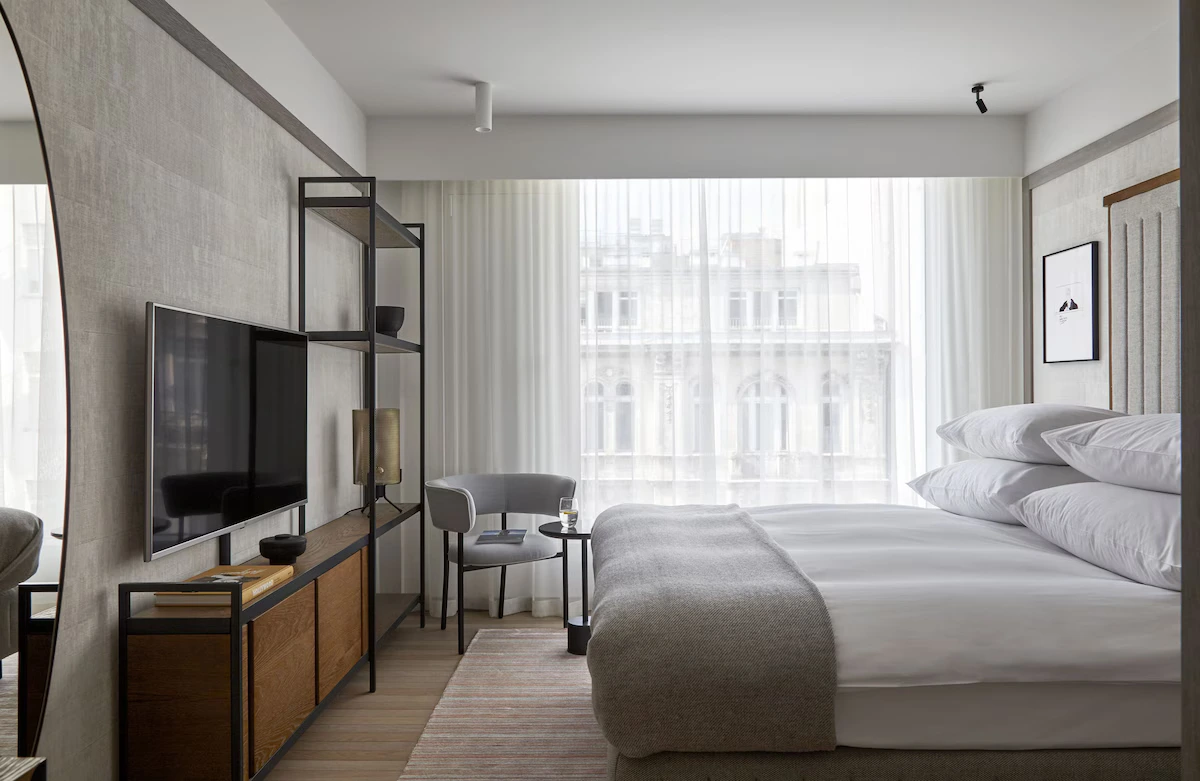 Classic Plus Queen room at PURO Warszawa Centrum with a city view